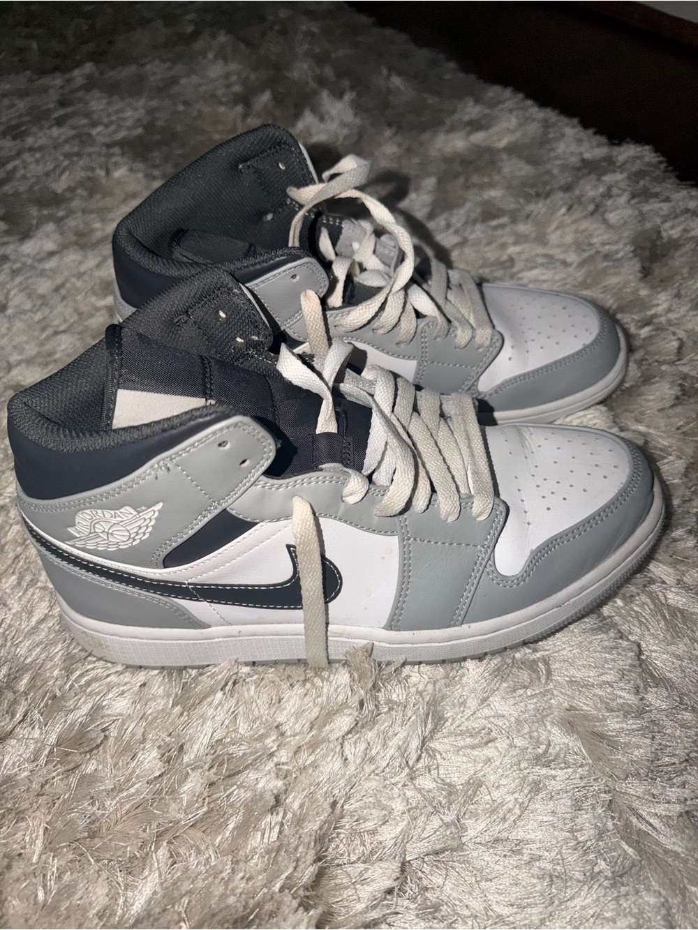 Jordan 1’s Grey & White High-Top Sneakers